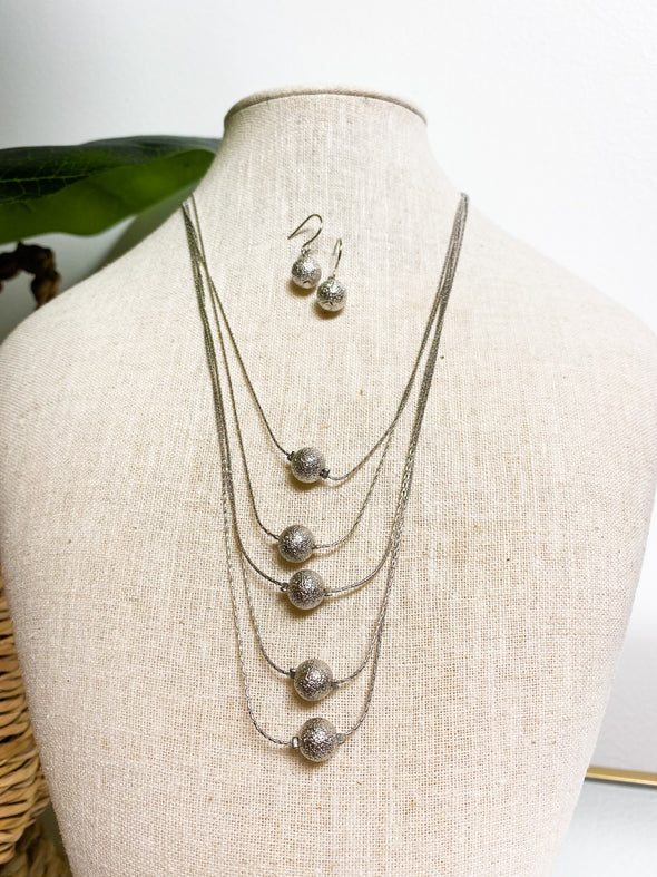 From a Distance Necklace Set