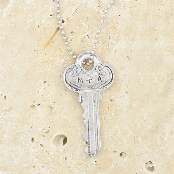 Fancy Silvertone You Hold the Key Necklace